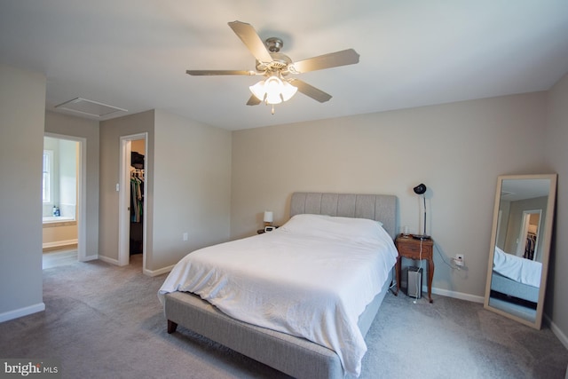 316 Pochards Ct, Martinsburg, WV 25403 - carpeted bedroom featuring a walk in closet, baseboards, a closet, and a ceiling fan