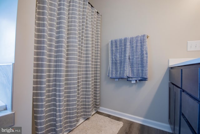 316 Pochards Ct, Martinsburg, WV 25403 - bathroom with wood finished floors, baseboards, and vanity