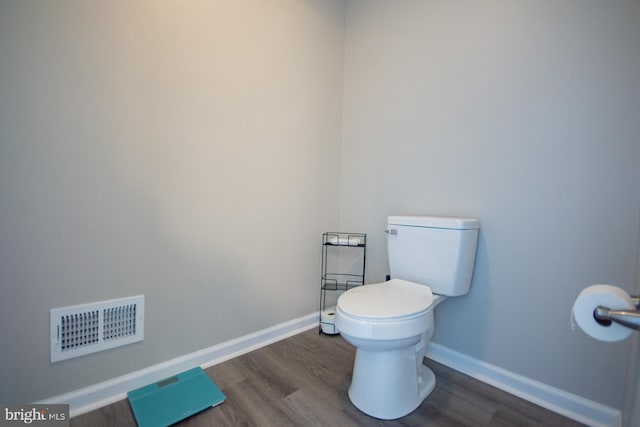 316 Pochards Ct, Martinsburg, WV 25403 - bathroom featuring toilet, wood finished floors, and baseboards