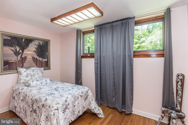 2500 Edge Hill Rd, Huntingdon Valley, PA 19006 - bedroom with baseboards, multiple windows, and wood finished floors