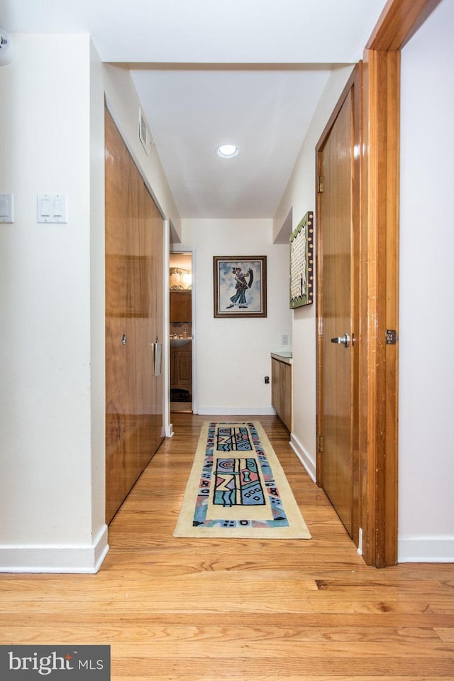 2500 Edge Hill Rd, Huntingdon Valley, PA 19006 - hall with wood finished floors, baseboards, and recessed lighting