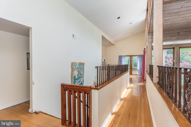 2500 Edge Hill Rd, Huntingdon Valley, PA 19006 - hall featuring an upstairs landing, wood finished floors, baseboards, and high vaulted ceiling