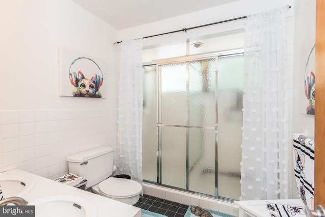 2500 Edge Hill Rd, Huntingdon Valley, PA 19006 - full bath featuring tile walls, a stall shower, toilet, vanity, and tile patterned flooring