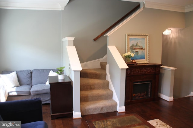 13512 Turquoise Ln, Herndon, VA 20170 - stairway with wood finished floors, crown molding, and a fireplace