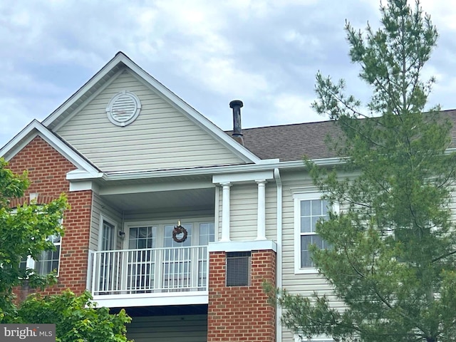5236 Millfield Rd Unit 5236, Baltimore, MD 21237 - view of front of house with covered porch and brick siding