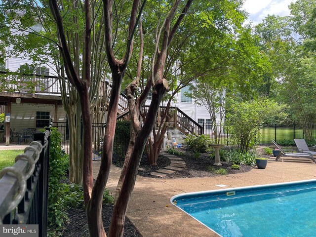 32 Misty Creek Ln, Fredericksburg, VA 22406 - view of swimming pool with stairway and a patio
