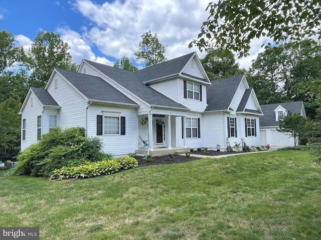 32 Misty Creek Ln, Fredericksburg, VA 22406 - traditional-style home featuring a porch, a shingled roof, and a front yard