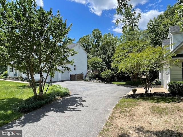 32 Misty Creek Ln, Fredericksburg, VA 22406 - view of side of home featuring driveway and a lawn