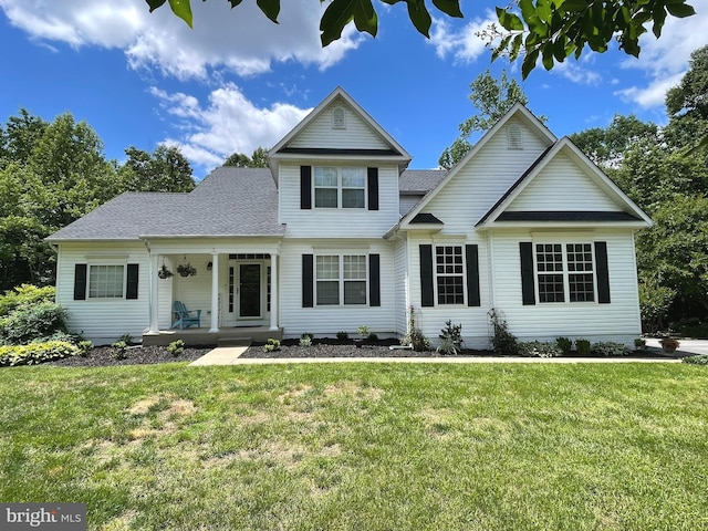 32 Misty Creek Ln, Fredericksburg, VA 22406 - view of front of home with covered porch, a front lawn, and a shingled roof