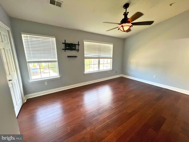 3327 Silverton Ln, Chesapeake Beach, MD 20732 - spare room with dark wood-type flooring and a ceiling fan