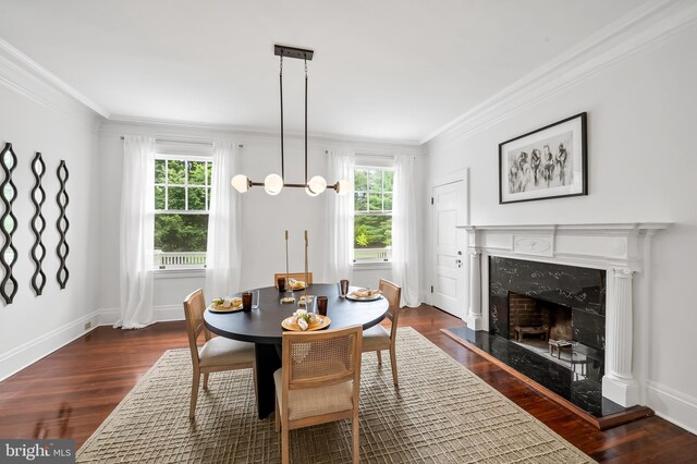3 Devon Hill Rd Unit D4, Baltimore, MD 21210 - dining area featuring ornamental molding, healthy amount of natural light, dark wood-style floors, and a high end fireplace