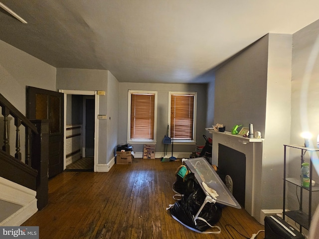 5541 Race St, Philadelphia, PA 19139 - living room featuring hardwood / wood-style floors, baseboards, and stairway