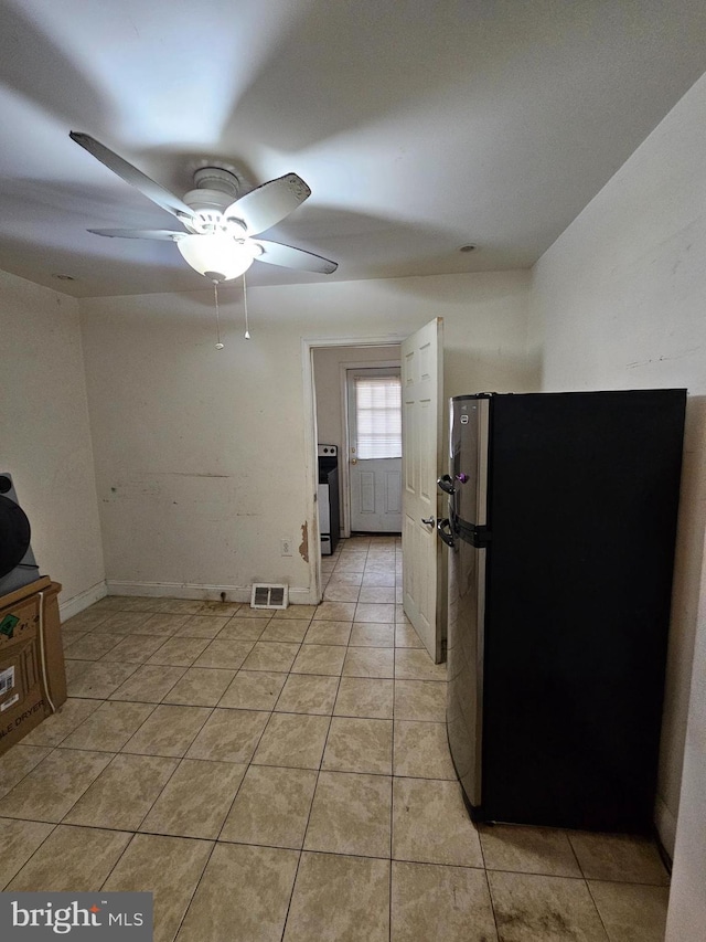 5541 Race St, Philadelphia, PA 19139 - unfurnished room with light tile patterned floors and ceiling fan