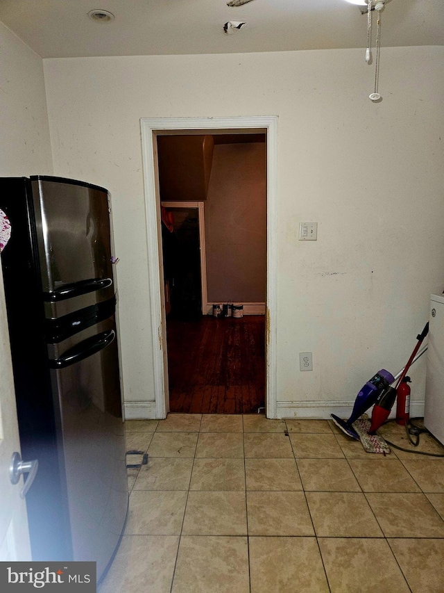 5541 Race St, Philadelphia, PA 19139 - kitchen featuring freestanding refrigerator and light tile patterned floors