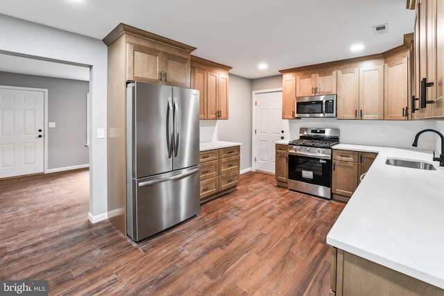 156 Dennis Ave, Browns Mills, NJ 08015 - kitchen with stainless steel appliances, a sink, baseboards, dark wood-style floors, and light countertops