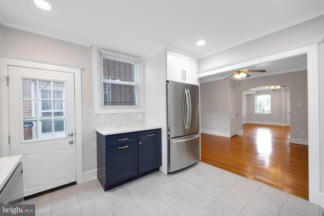 4441 Sherwood Rd, Philadelphia, PA 19131 - kitchen featuring freestanding refrigerator, light countertops, light tile patterned floors, a ceiling fan, and recessed lighting