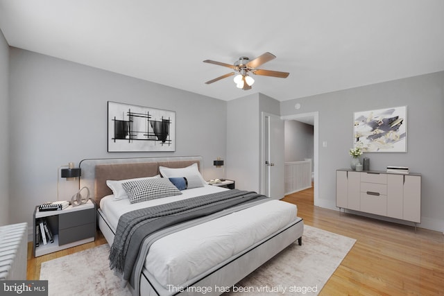 4441 Sherwood Rd, Philadelphia, PA 19131 - bedroom featuring light wood-style floors, ceiling fan, and baseboards