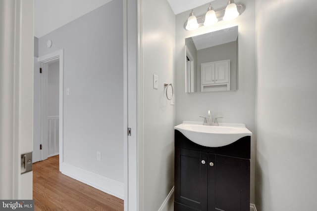 4441 Sherwood Rd, Philadelphia, PA 19131 - bathroom featuring vanity, wood finished floors, and baseboards