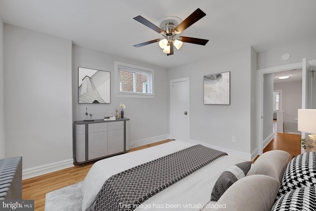 4441 Sherwood Rd, Philadelphia, PA 19131 - bedroom with wood finished floors, baseboards, and ceiling fan