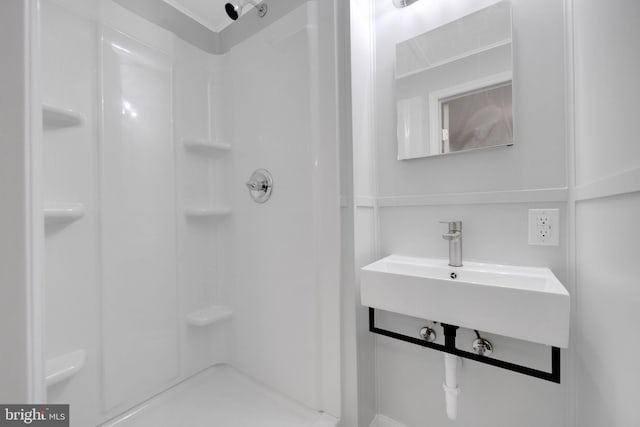 4441 Sherwood Rd, Philadelphia, PA 19131 - full bathroom featuring a stall shower and a sink