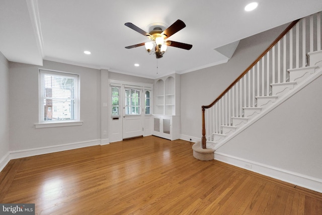 4441 Sherwood Rd, Philadelphia, PA 19131 - entrance foyer with wood finished floors, a ceiling fan, baseboards, recessed lighting, and stairs