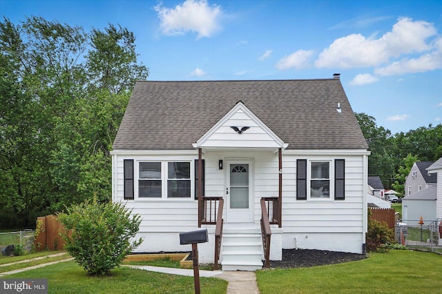 12 N Hawthorne Rd N, Middle River, MD 21220 - view of front facade with a shingled roof