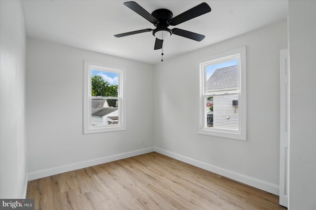 12 N Hawthorne Rd N, Middle River, MD 21220 - empty room featuring light wood-type flooring, baseboards, and a ceiling fan