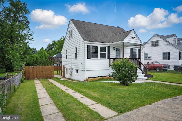 12 N Hawthorne Rd N, Middle River, MD 21220 - view of front of property with a shingled roof and a porch
