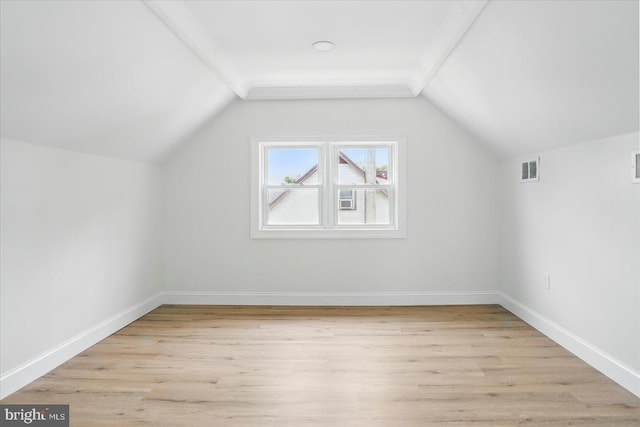 12 N Hawthorne Rd N, Middle River, MD 21220 - bonus room featuring light wood finished floors, baseboards, and vaulted ceiling