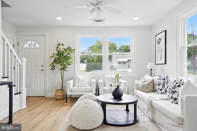 12 N Hawthorne Rd N, Middle River, MD 21220 - living room featuring light wood-style flooring, stairs, a ceiling fan, recessed lighting, and baseboards