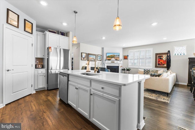 8051 Keystone Dr, Breinigsville, PA 18031 - kitchen with a sink, stainless steel appliances, open floor plan, plenty of natural light, and recessed lighting