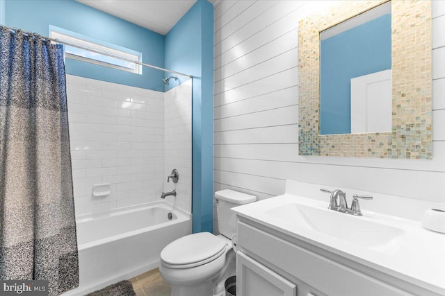 8051 Keystone Dr, Breinigsville, PA 18031 - bathroom featuring shower / tub combo, vanity, toilet, tile patterned flooring, and wood walls