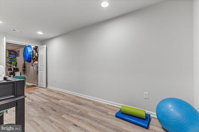 8051 Keystone Dr, Breinigsville, PA 18031 - exercise room featuring recessed lighting, light wood-style floors, and baseboards