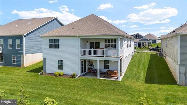 8051 Keystone Dr, Breinigsville, PA 18031 - back of property featuring a patio area, central air condition unit, a yard, and a shingled roof