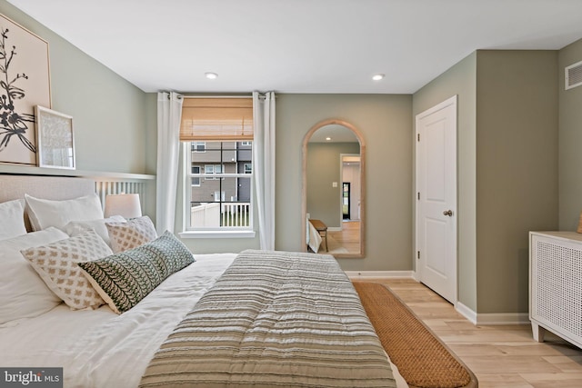 TBB Fontana Circle Whitehall Ii, Martinsburg, WV 25403 - bedroom with wood finished floors, arched walkways, baseboards, and recessed lighting