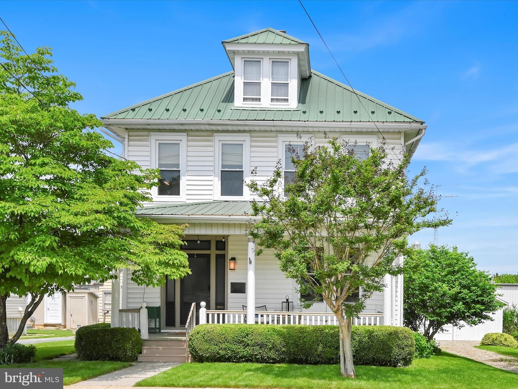365 E Jackson St, New Holland, PA 17557 - view of front of property with a porch, metal roof, and a front yard