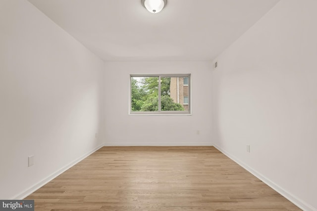 7056 Eastern NW Unit 308, Washington, DC 20012 - unfurnished room featuring light wood finished floors and baseboards
