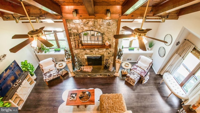 11500 Golden Post Ln, Gaithersburg, MD 20878 - living room with a ceiling fan, wooden ceiling with exposed beams, wood finished floors, a fireplace, and baseboards