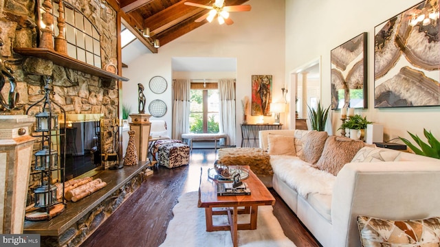 11500 Golden Post Ln, Gaithersburg, MD 20878 - living room featuring high vaulted ceiling, wood finished floors, a ceiling fan, wood ceiling with exposed beams, and a stone fireplace