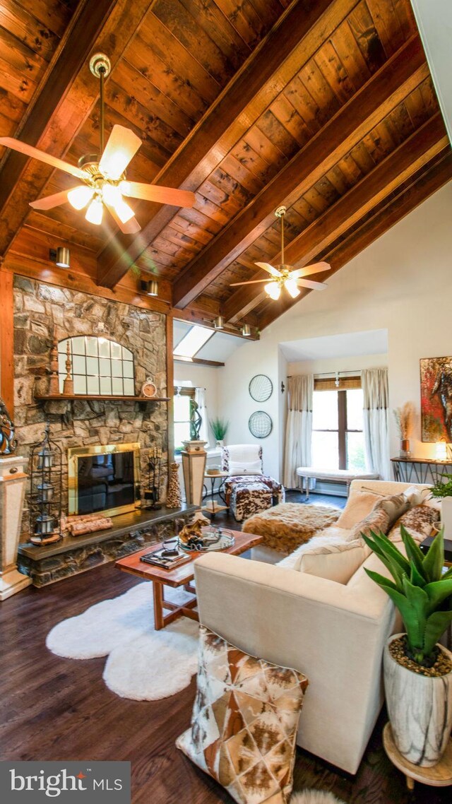 11500 Golden Post Ln, Gaithersburg, MD 20878 - living area featuring a ceiling fan, wood ceiling, a stone fireplace, and wood finished floors