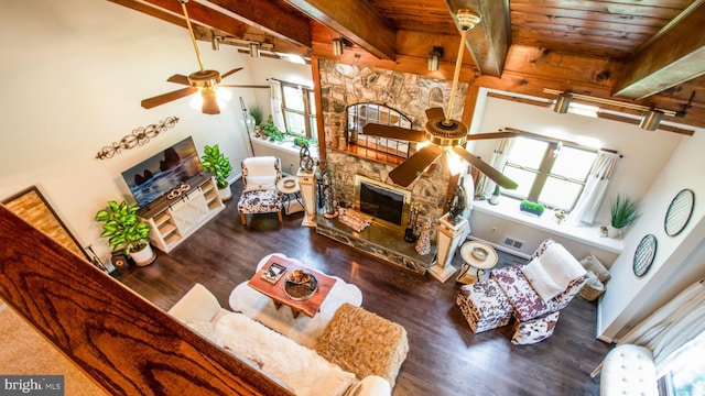 11500 Golden Post Ln, Gaithersburg, MD 20878 - living area with a ceiling fan, wood ceiling with exposed beams, wood finished floors, and a stone fireplace