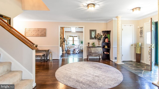 11500 Golden Post Ln, Gaithersburg, MD 20878 - entrance foyer with decorative columns, stairs, ornamental molding, wood finished floors, and baseboards