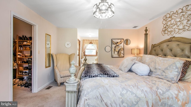 11500 Golden Post Ln, Gaithersburg, MD 20878 - carpeted bedroom with a walk in closet, a closet, and baseboards