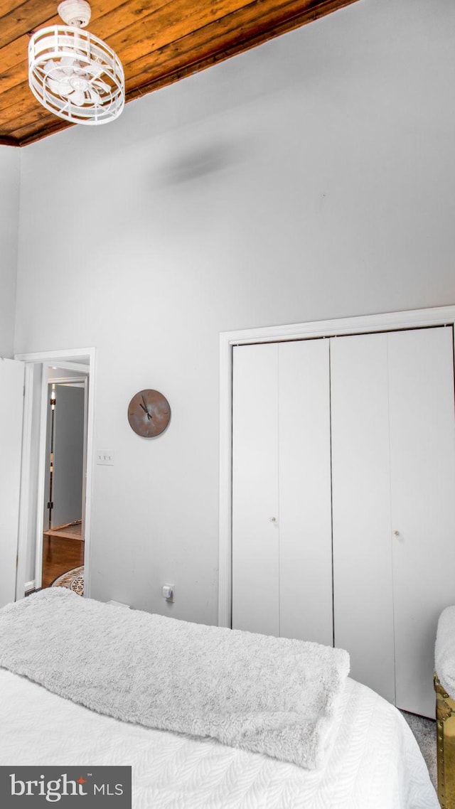 11500 Golden Post Ln, Gaithersburg, MD 20878 - bedroom featuring a closet, wooden ceiling, and a chandelier