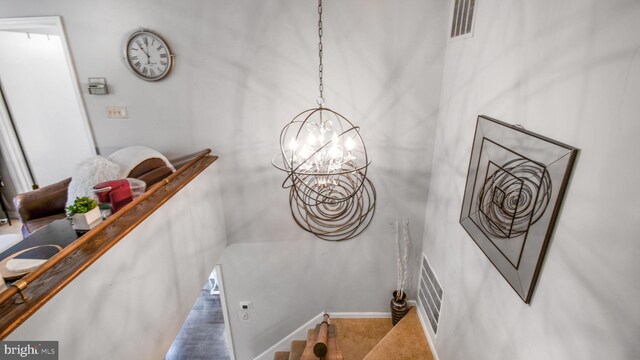 11500 Golden Post Ln, Gaithersburg, MD 20878 - stairs featuring a chandelier, baseboards, and carpet floors