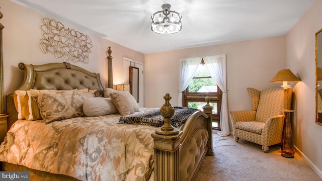11500 Golden Post Ln, Gaithersburg, MD 20878 - bedroom featuring light colored carpet, a chandelier, and baseboards