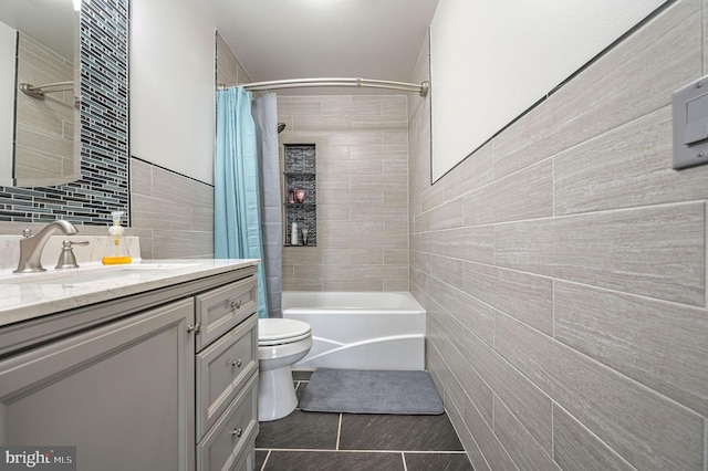 20 Doe Hill Ct, Camden Wyoming, DE 19934 - full bathroom with tile walls, toilet, tile patterned flooring, vanity, and shower / tub combo with curtain