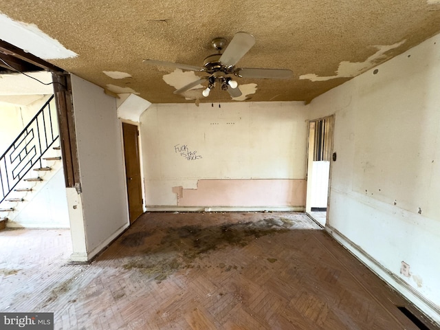 2244 E Washington Ln, Philadelphia, PA 19138 - spare room featuring a ceiling fan, stairway, and baseboards
