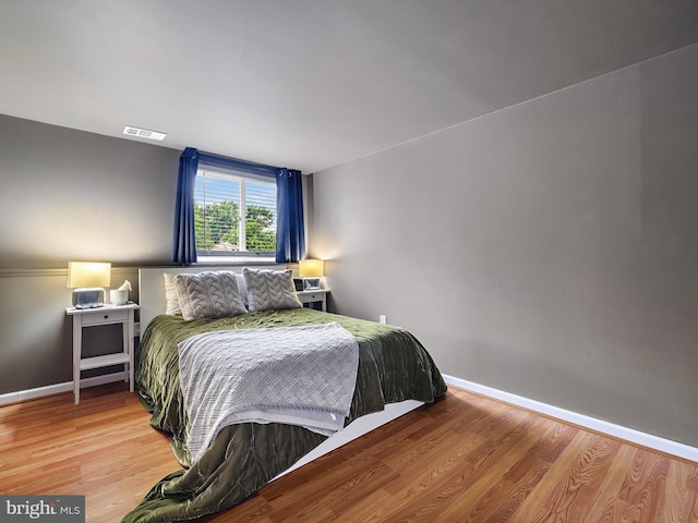 8579 Main Ave, Pasadena, MD 21122 - bedroom featuring wood finished floors and baseboards