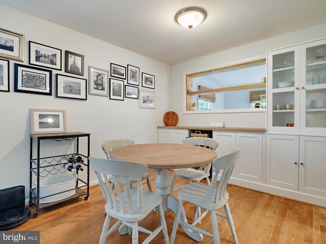 8579 Main Ave, Pasadena, MD 21122 - dining area featuring light wood-style flooring